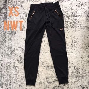 Classic Joggers rose gold details not selling